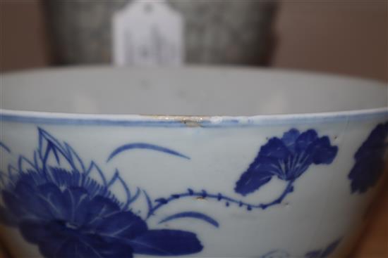 A Chinese crackle glaze bowl, early 20th century blue and white bowl and a wood stand largest diameter 17cm